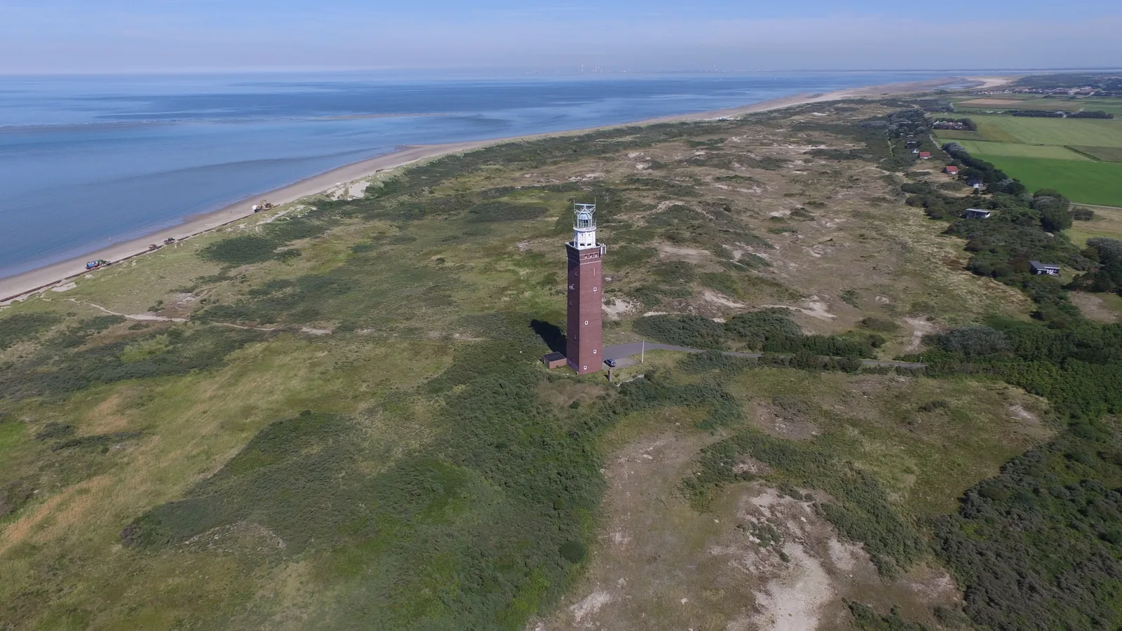 Westhoofd lighthouse, dunes and North Sea at Ouddorp